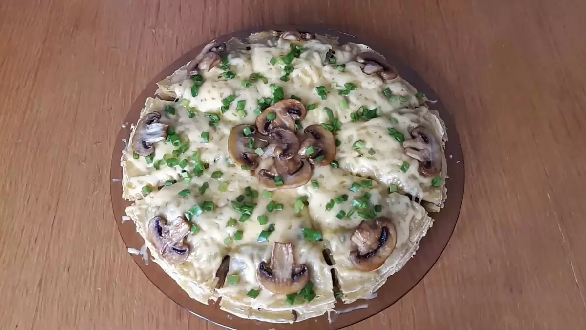Изысканный блинный торт с грибами и сыром: идеальное угощение на масленицу